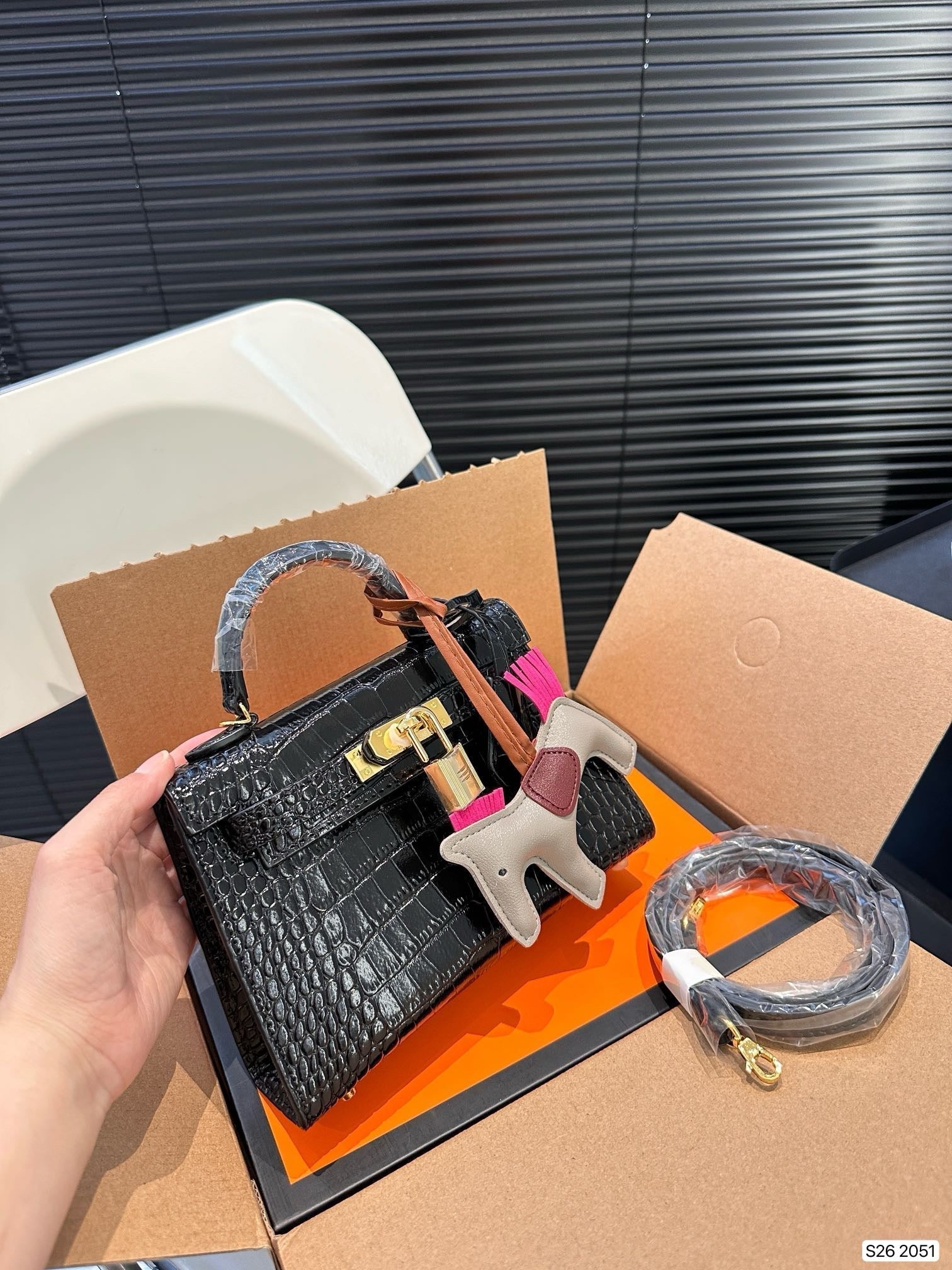 Hermes Brikin with horse black handbag