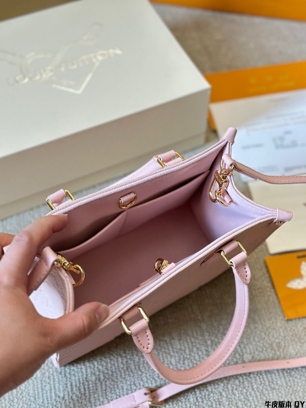 Louis Vuitton pink OTG handbag