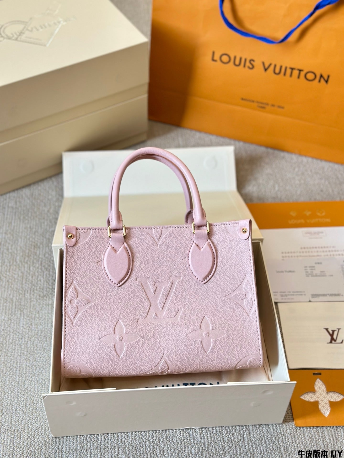 Louis Vuitton pink OTG handbag