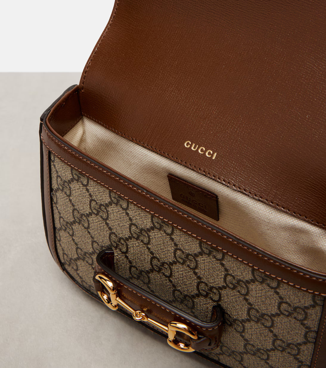 Gucci Gucci Horsebit 1955 Mini leather-trimmed shoulder bag 2025